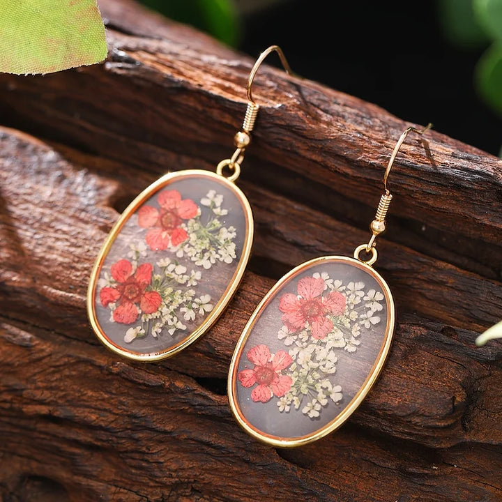 Brincos vintage com design floral oval feito à mão