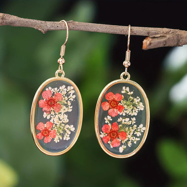 Brincos vintage com design floral oval feito à mão