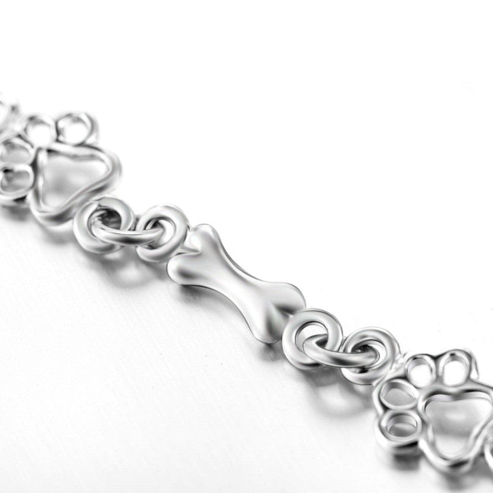 Pulseira de Charms em Prata Esterlina com Design de Patinha e Osso de Cão - Edição Limitada