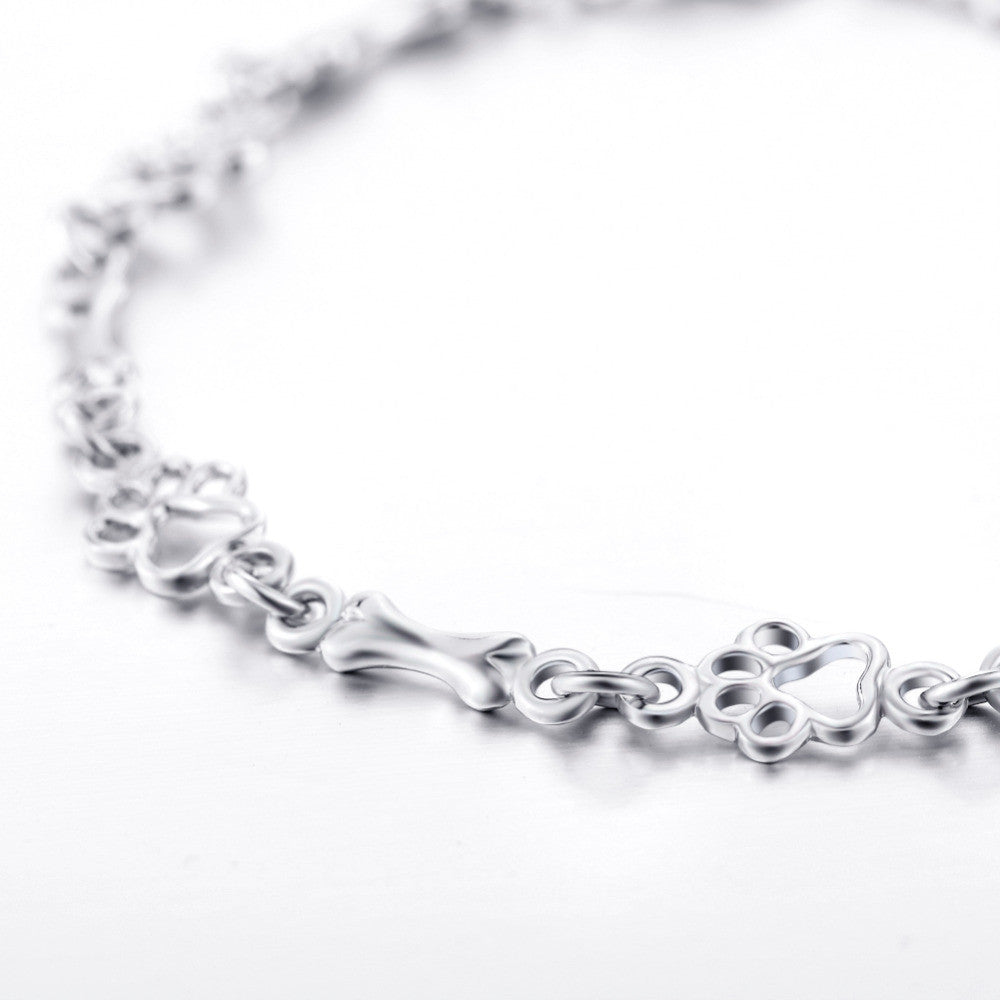 Pulseira de Charms em Prata Esterlina com Design de Patinha e Osso de Cão - Edição Limitada