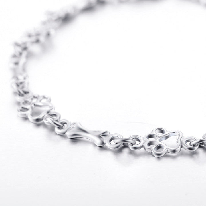 Pulseira de Charms em Prata Esterlina com Design de Patinha e Osso de Cão - Edição Limitada