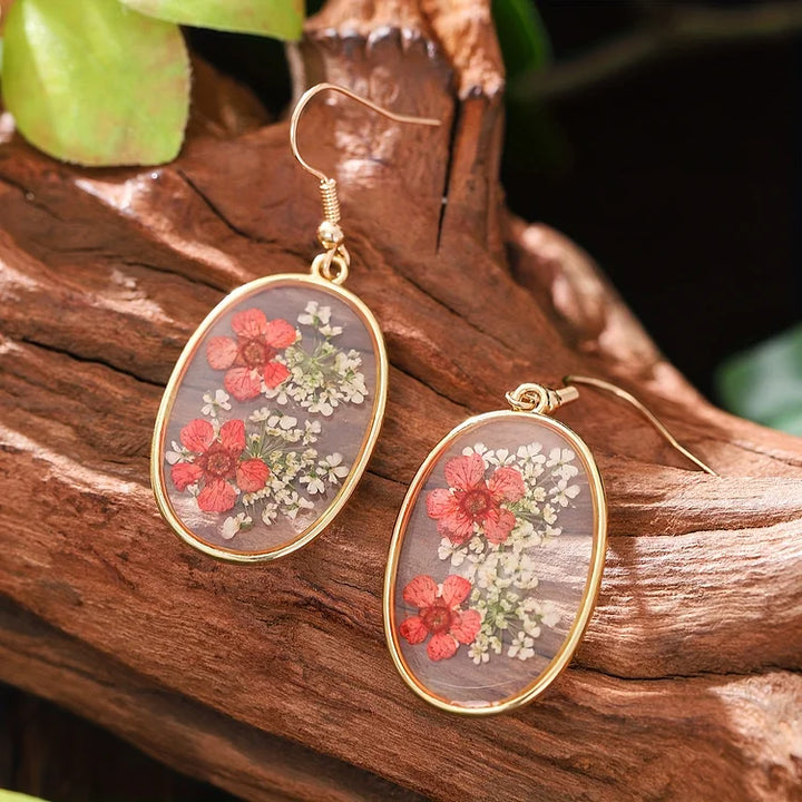 Brincos vintage com design floral oval feito à mão